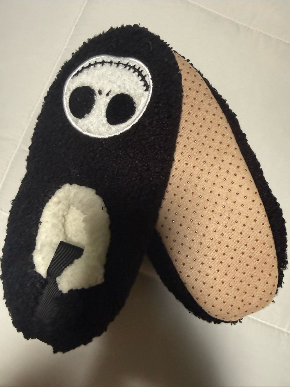 Womens Jack Skellington Black Plush One-Piece Slippers